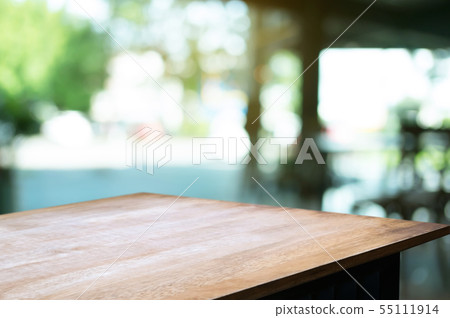 empty wood table in front of blurred montage home empty wood table in front of blurred montage home 55111914