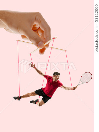 Man like a puppet in somebodies hands. Concept of manipulation Man like a puppet in somebodies hands. Concept of manipulation 55112000
