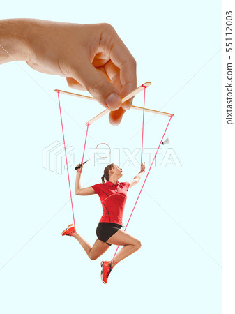 Woman like a puppet in somebodies hands. Concept of manipulation Woman like a puppet in somebodies hands. Concept of manipulation 55112003