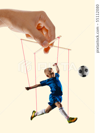 Boy like a puppet in somebodies hands. Concept of manipulation Boy like a puppet in somebodies hands. Concept of manipulation 55112080