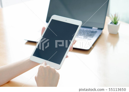 Business woman using laptop and smart phone stock 55113650