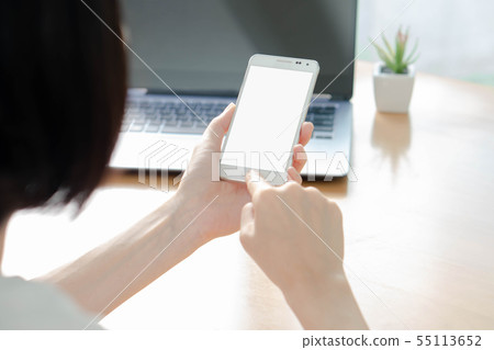 Business woman using laptop and smart phone stock 55113652