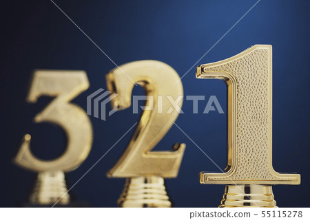 Three golden number trophies in front of blue Three golden number trophies in front of blue 55115278