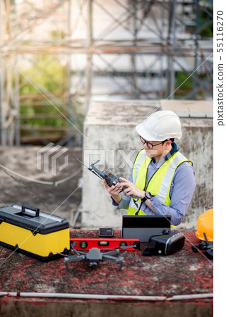 Asian engineer man using drone for site survey 55116270