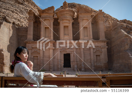 Asian woman tourist sitting in Petra, Jordan Asian woman tourist sitting in Petra, Jordan 55116399