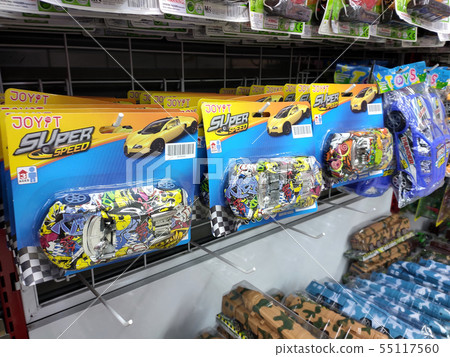 Children's toys are hung and displayed for sale  55117560