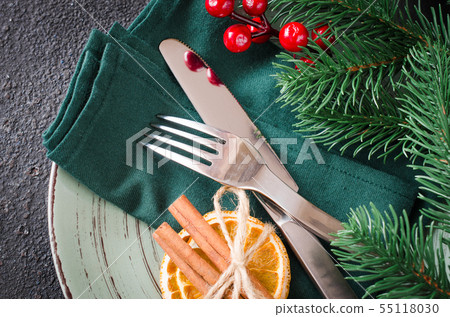 Christmas festive table setting with decorations 55118030