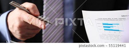 Businessmen and woman look and study statistics Businessmen and woman look and study statistics 55119441