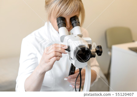 Young female professional gynecologist in the Young female professional gynecologist in the 55120407