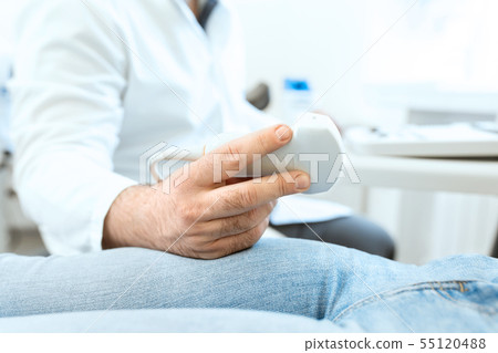 Young woman having 4D ultrasound scan. Ultrasound Young woman having 4D ultrasound scan. Ultrasound 55120488