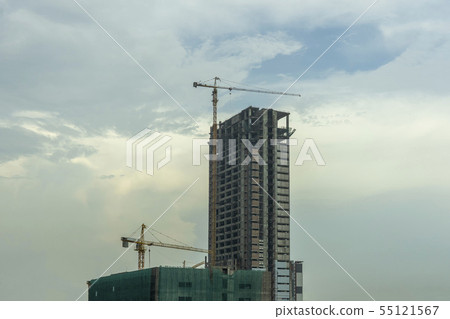 building site with cranes and blue sky building site with cranes and blue sky 55121567