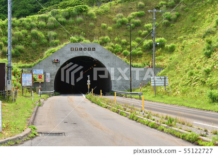 Photographing the summer landscape of the Raiden tunnel at Iwadencho Raiden coast in Hokkaido 55122727