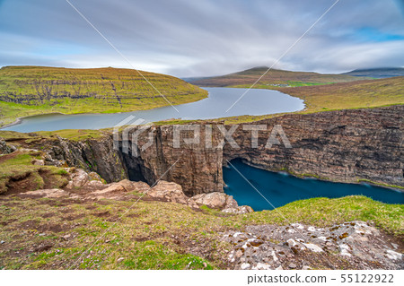 Sorvagsvatn lake over cliffs of Vagar island long exposure, Faroe Islands Sorvagsvatn lake over cliffs of Vagar island long exposure, Faroe Islands 55122922