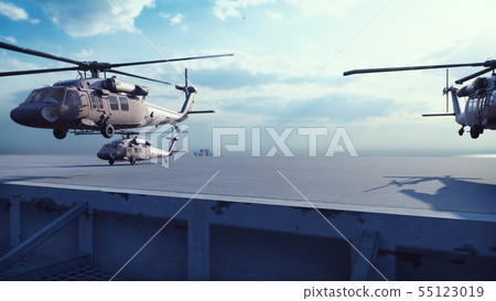 Military helicopters Blackhawk take off from an aircraft carrier at clear day in the endless blue Military helicopters Blackhawk take off from an aircraft carrier at clear day in the endless blue 55123019