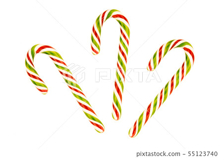 three sugar candy cane green red on a white 55123740