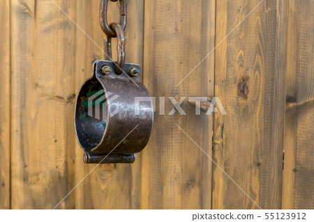 chained iron shackles traditional handcuffs on 55123912