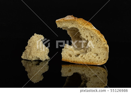 Rye wheat bread isolated on black glass Rye wheat bread isolated on black glass 55126986