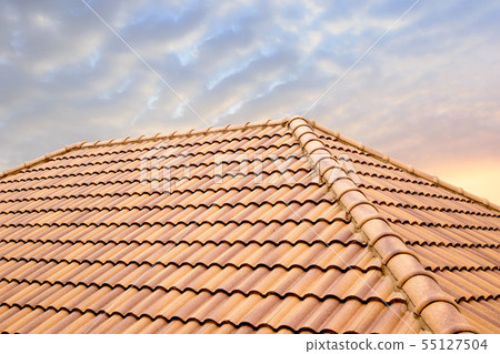 Roof tiles and sky sunlight. Roof tiles and sky sunlight. 55127504