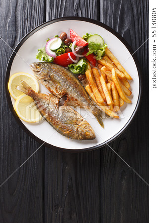 Traditional fried Sarpa salpa fish with lemon and 55130805