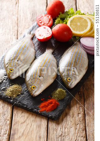 Preparation for cooking Sarpa salpa fish with Preparation for cooking Sarpa salpa fish with 55130811