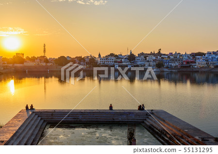 Ghats at Pushkar lake at sunset in Rajasthan. 55131295