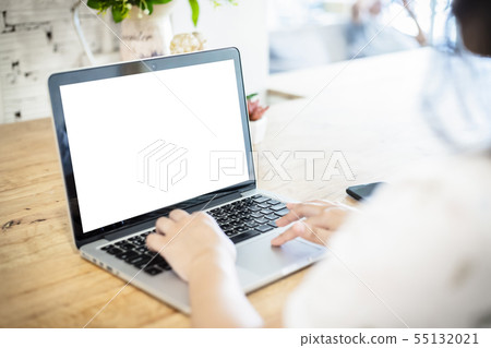 Close-up of business female working with laptop Close-up of business female working with laptop 55132021