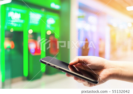 Close-up of female use Hand holding smartphone 55132042