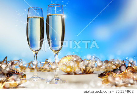 Champagne glasses ready to bring in the New Year Champagne glasses ready to bring in the New Year 55134908