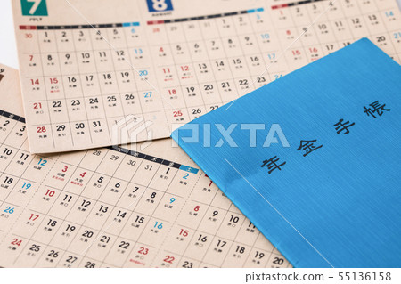 Pension notebook and calendar modern problems on white background, aging Pension notebook and calendar modern problems on white background, aging 55136158