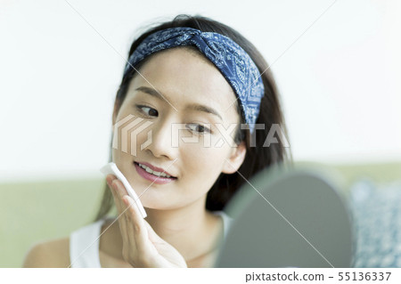 Young lady skin care 55136337