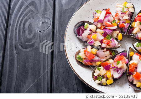 Traditional Peruvian food background with mussels Traditional Peruvian food background with mussels 55138433