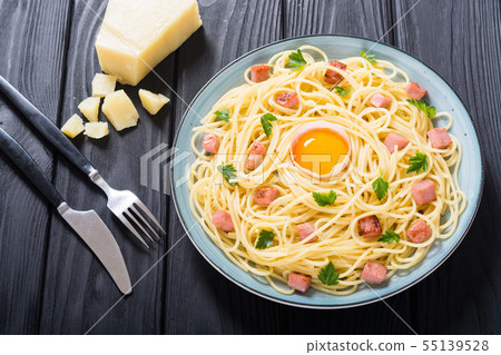 Itslian pasta carbonara with sausage and egg 55139528