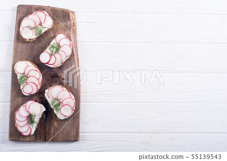 Healthy vegetable toasts sandwith with radish and Healthy vegetable toasts sandwith with radish and 55139543