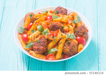Italian penne pasta with meatballs and tomatoes 55140114