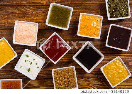 Set of different sauces in ceramic bowl 55140139