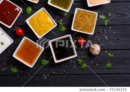 Set of different sauces in ceramic bowl Set of different sauces in ceramic bowl 55140155