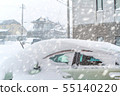 Car covered with snow during snowstorm 55140220
