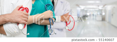 Doctor working in hospital with other doctors. Doctor working in hospital with other doctors. 55140607