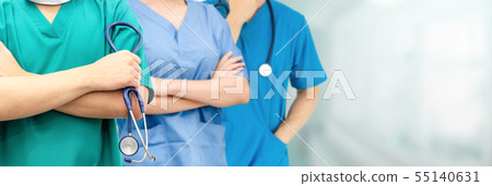 Doctor working in hospital with other doctors. 55140631