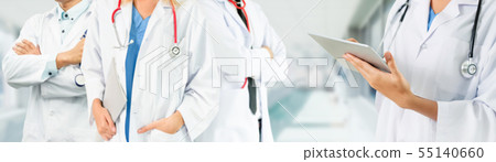 Doctor working in hospital with other doctors. 55140660