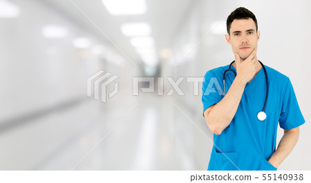 Young male doctor working at the hospital. 55140938