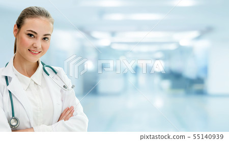 Woman doctor working at the hospital office. 55140939