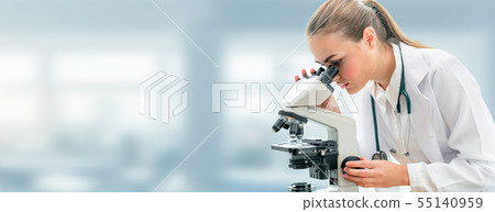 Scientist researcher uses microscope in laboratory 55140959