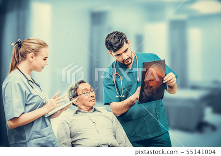 Surgeon working with nurse and patient in hospital Surgeon working with nurse and patient in hospital 55141004