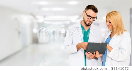 Doctors working with colleague in the hospital. 55141072