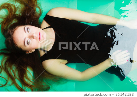 Sexual posing woman in water. 55142188
