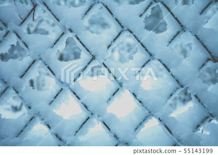 Snow on the metal grid Snow on the metal grid 55143199