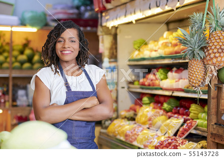 Pretty grocery store saleswoman Pretty grocery store saleswoman 55143728