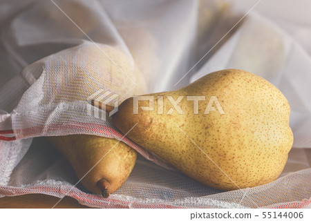 Pears in a reusable shopping bag. Eco-friendly Pears in a reusable shopping bag. Eco-friendly 55144006