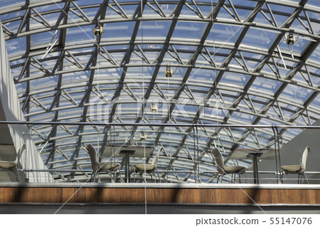 Modern cafe under the dome of glass and metal. Modern cafe under the dome of glass and metal. 55147076